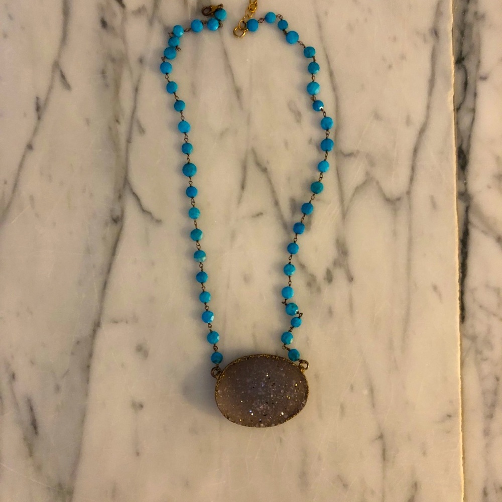 Turquoise beaded necklace with stone pendant
